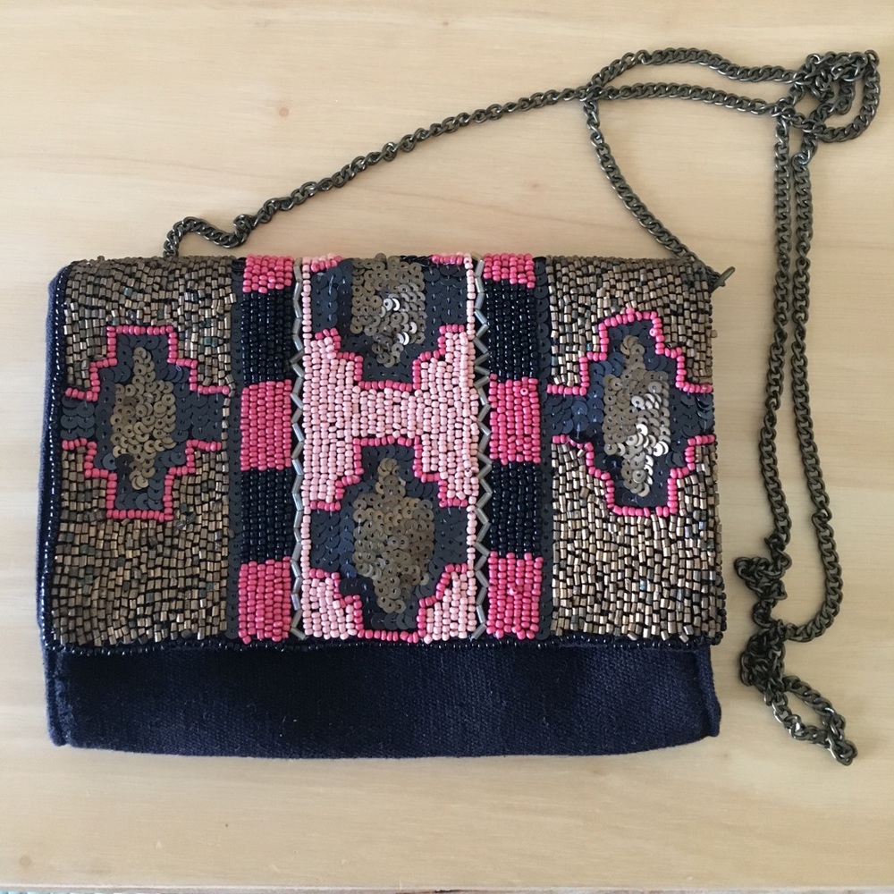 Cute little beaded and sequins  bag with chain.
